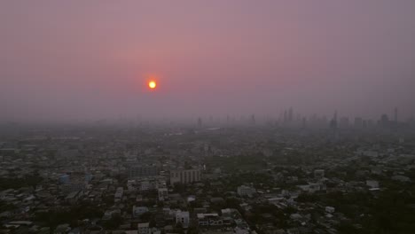 Aerial-top-view-of-sunrise-with-beautiful-cityscape-of-Bangkok-city-in-Thailand