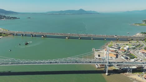 A-bird's-eye-view-captures-the-famous-Hercilio-Luz-Bridge-in-Florianopolis,-connecting-the-mainland-with-the-island