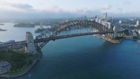 The-Sydney-Harbour-Bridge-,-an-iconic-steel-through-arch-bridge