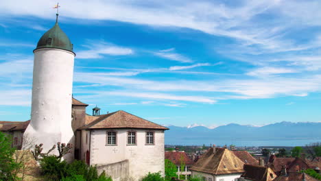 Aubonne-church,-Switzerland,-moving-right-to-reveal-the-scenic-background