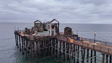 Oceanside-California-Pier-Fire-Damaged-Former-Rubys-Diner-Restaurant-Drone-Circle-Path-Clockwise-Rotation