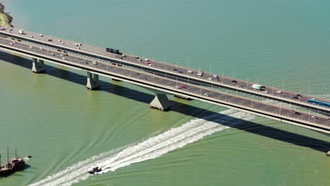 Busy-traffic-crossing-a-bridge-connecting-an-island-to-the-mainland