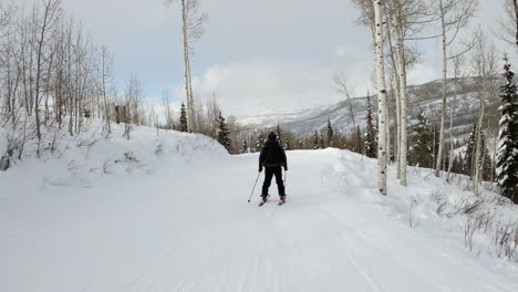 Skiing-Adventure-in-Steamboat-Springs,-Colorado:-Black-Skier-on-Slopes