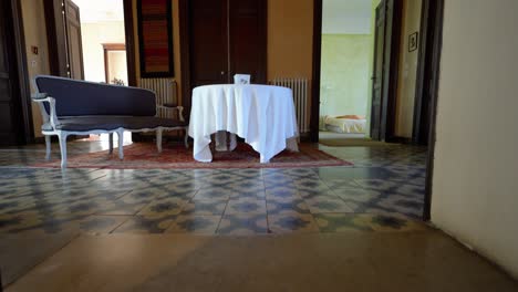 Slow-dolly-shot-upstairs-in-a-retro-villa-in-Pignan-with-tiled-floors