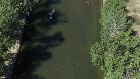 Drone-footage-of-people-floating-down-boise-river-in-summer