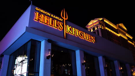 Las-Vegas-USA,-Exterior-of-Gordon-Ramsay-Hell's-Kitchen-Restaurant-at-Night-in-Front-of-Caesars-Palace-Hotel-and-Casino
