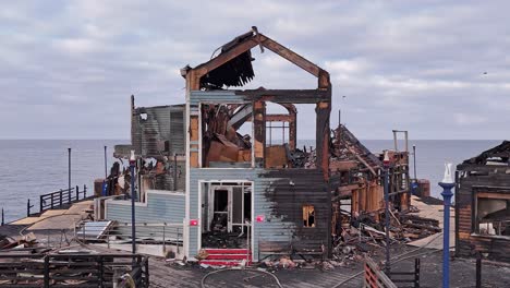 Oceanside-California-Pier-Fire-Damaged-Former-Rubys-Diner-Restaurant-Front-Side-Drone-Vertigo-Style-Dolly-Zoom-Effect