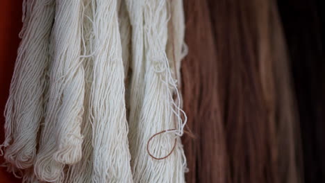 Natural-colored-dark-white-tan-brown-fibers-of-woven-yarn,-detailed-closeup
