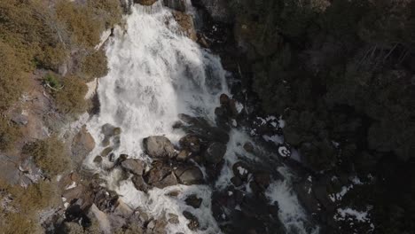 Owen-sound-waterfall-in-ontario,-canada,-with-rushing-water-over-rocks,-aerial-view