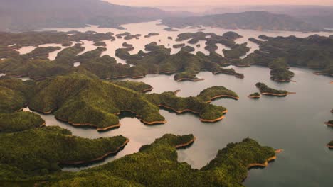 Sunset-at-Tà-Đùng-in-Vietnam,-Asia,-a-beautiful-lake-with-a-scenic-island-archipelago