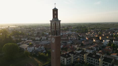 Brick-Clock-Tower-At-Sunset-In-Mira-Town,-Southern-Veneto,-Northern-Italy
