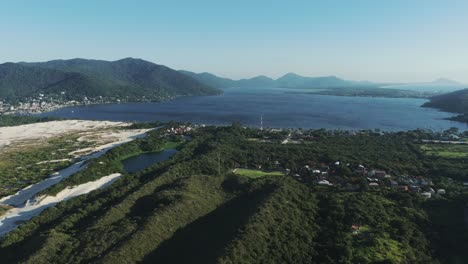 Aerial-view-captures-the-renowned-Lagoa-da-Conceição,-nestled-in-the-heart-of-Florianopolis,-Santa-Catarina,-Brazil