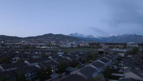 Silicon-Slopes-in-Lehi,-Utah-at-twilight---aerial-parallax