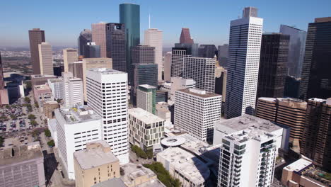Aerial-View-of-Houston-Downtown-Buildings-and-Skyscrapers,-Texas-USA,-Revealing-Drone-Shot