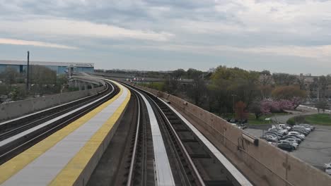Overground-to-the-New-York-Airport-with-a-view-of-American-Airlines,-United-States