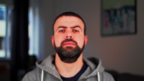 Bearded-Middle-Eastern-Caucasian-Man-With-A-Serious-Face-Looking-At-Camera