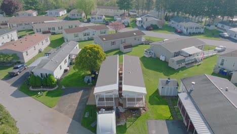 MayAn-Aerial-View-of-a-Manufactured,-Mobile,-Prefab-Double-Wide-Home-Being-Installed-in-a-Lot-in-a-Park