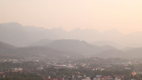 layers-of-mountains-during-sunset-in-Luang-Prabang,-Laos-traveling-Southeast-Asia
