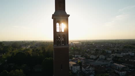 Bell-Tower-Backlit-Sunset-Light-Over-Mira-Town-In-The-Southern-Veneto,-Northern-Italy