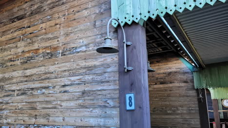 Old-historic-wooden-house-entrance-in-panning-shot