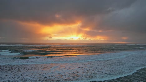 Dramatic-Sunset-Sky-Over-Tasman-Sea-With-Waves