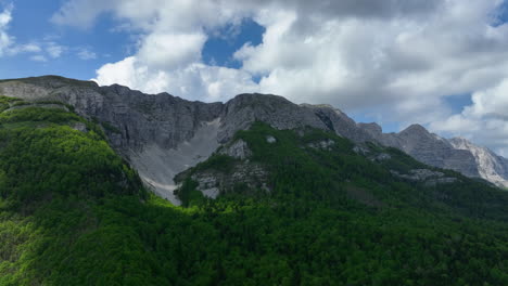 A-view-of-the-mountain,-which-is-overgrown-with-forest-in-the-lower-areas,-towards-the-higher-parts-of-the-rocks