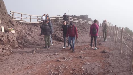 Travelers-Walking-On-Trail-At-Mount-Vesuvius-Crater-In-Naples,-Italy