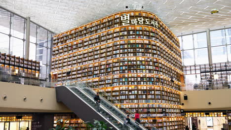 People-On-Escalators-Inside-The-Byeolmadang-Library-At-COEX-Mall-In-Suwon,-South-Korea