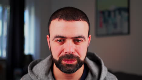 Portrait-Of-A-Bearded-Man-Smiling-At-Camera