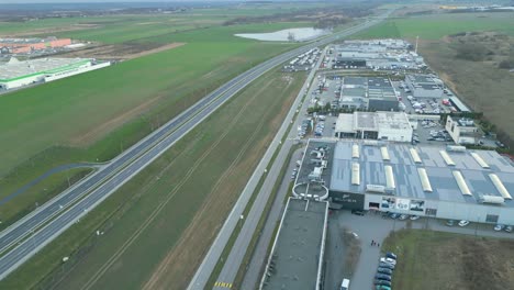 Aerial-View-Over-Silver-Hotel,-BMW-And-Ford-Car-Dealers-In-Szczecin,-Poland---Drone-Shot