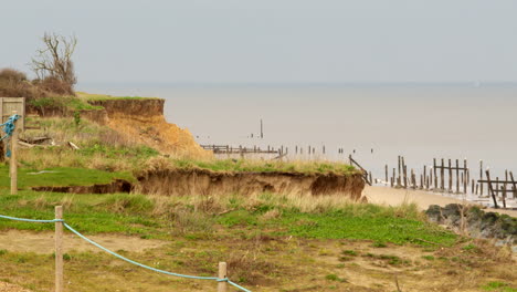 Wide-shot-of-coastal-erosion-and-failed-derelict-sea-defences-at-Happisburgh-in-March-2024