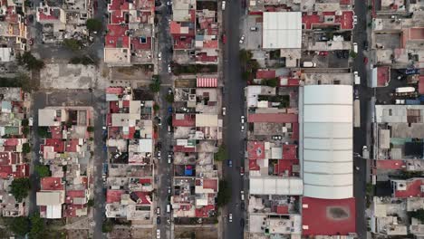 Birdseye-perspective-streets-of-Ecatepec,-houses-and-cars,-within-its-residential-enclave,-northern-suburbs-of-CDMX