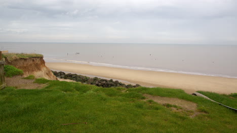 extra-wide-shot-of-the-coastal-erosion-of-the-cliffs-at-Happisburgh-in-March-2024
