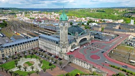 Limoges-Benedictins-station,-France.-Aerial-backward-and-cityscape