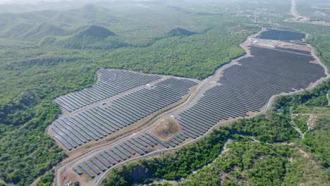 Swathes-of-lush-jungle-cleared-for-solar-farm-with-photovoltaic-system,-aerial