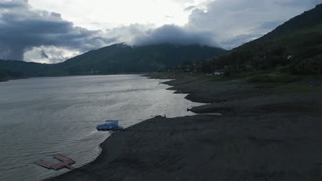 Aerial-Lake-Calima-at-Sunset-Close-to-Ground