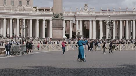 Woman-taking-a-photo-in-the-central-square-of-St