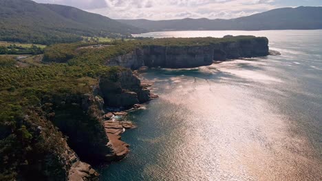 Forward-drone-shot-of-Tasman-National-Park-during-sunny-day-in-Australia
