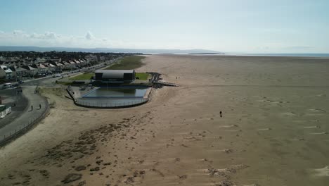 Hoylake-Beachfront-conservation-area---aerial-drone-flyover-from-meols,-highlighting-Spartina-grass,-Wirral,-UK