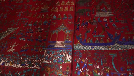 colored-glass-mosaics-of-Wat-Xieng-Thong-buddhist-temple-in-Luang-Prabang,-Laos-traveling-Southeast-Asia