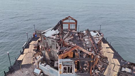 Oceanside-Pier-Fire-Damaged-Restaurant-Flyover-Front-To-Back-High-View-of-Former-Rubys-Diner-Location