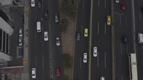Top-Down-Aerial-View-of-Avenue-Car-Traffic-in-Mexico-City-Suburbia