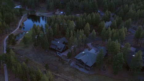 Aerial-View-of-Isolated-American-Residential-Community-in-Woods-and-Green-Landscape-at-Daybreak,-Drone-Shot