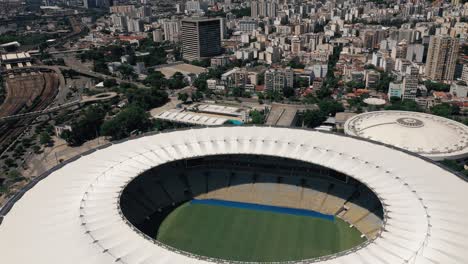 Aerial-View-Of-Famous-Maracana-Stadium,-Maracanazinho-And-Rio-De-Janeiro-Cityscape