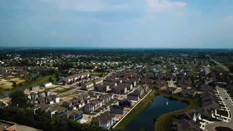 Fly-Over-Small-Beautiful-Town-With-Summer-Colors