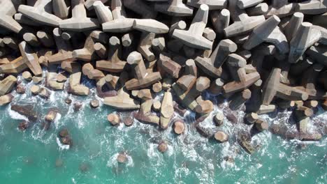 a-drone-shot-above-breakwater-at-israeli-south-city,-ashkelon