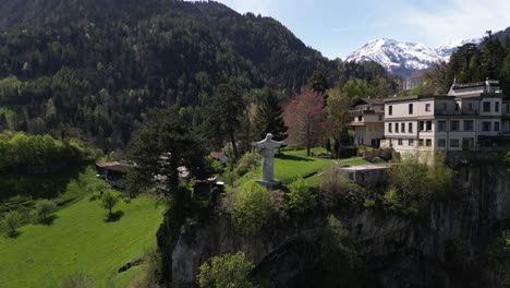 Aerial-view-of-Hotel-Schloss-Wartenstein,-Castle-Garden-with-Cristo-Salvador,-St