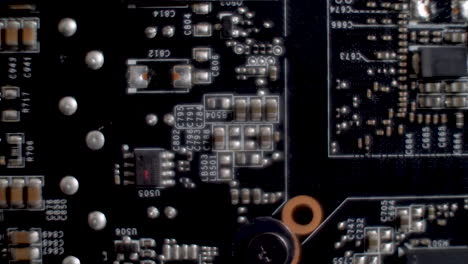 Macro-Close-Up-View-Of-an-SLI-interface-on-the-back-of-a-graphics-card,-detailing-the-circuitry-and-PCB-layout,-tech-focused