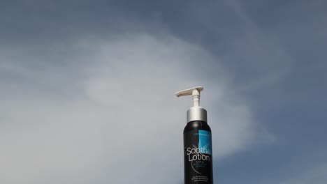 CBD-Revolution-Products-with-a-back-drop-of-clouds-time-lapse-in-Oregon-lotion