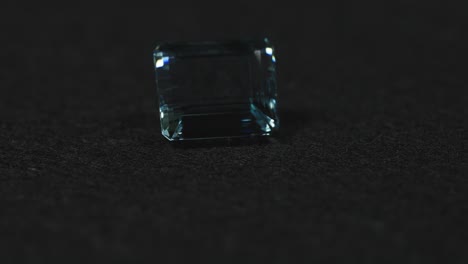 Polished-blue-gemstone-rotates-and-sparkles